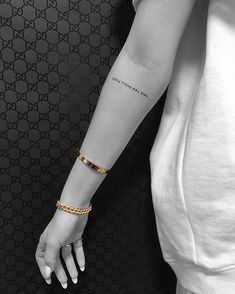 a woman's arm with a gold bracelet on her wrist and the words instagram