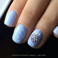 From candy-cane stripes to snowmen, unique winter motifs are a creative way to bling out your nails for the holidays. Try these wildly fun designs and add extra pizzazz to your outfit! Blue Christmas Nails, Holiday Nails Winter, Holiday Nails Christmas, Nails Winter, Holiday Nail Art, Vacation Nails, Blue Nail