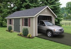 a car is parked in front of a garage