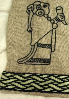 a close up of a piece of cloth with a drawing on it