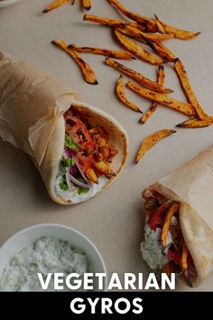 Looking for a delicious and filling vegetarian option for dinner? These vegetarian gyros are stuffed in a warm pita with saucy harissa chickpeas, creamy tzatziki sauce, sweet potato fries, and fresh veggies. Vegetarian Gyro Recipe, Vegetarian Gyro, Vegetarian Gyros, Harissa Chickpeas, Gyro Recipe