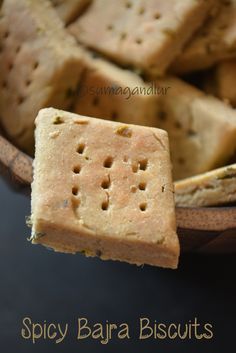 a bowl filled with crackers sitting on top of a table