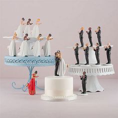 wedding cake toppers and figurines on display