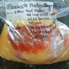 there is a bag of chicken burritos wrapped in plastic