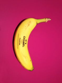 a ripe banana on a pink background with the words can't wait written on it