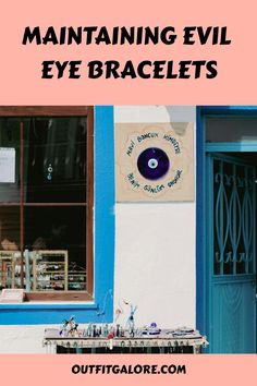 Maintaining evil eye bracelets displayed on a table outside a shop with a blue evil eye wall decoration. Symbol Of Protection, Dos And Don'ts, Do's And Don'ts, Spiritual Meaning, Eye Bracelet, Evil Eye Jewelry