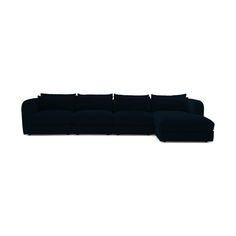 a black sectional couch with pillows on the top and bottom, in front of a white background