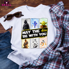 🌟 May the 4th Be With You! 🌟 Gear up for Star Wars Day with our exclusive collection of T-shirts, long sleeves, and sweatshirts! Celebrate in style with our featured Star Wars tee! Plus, don't miss out on our Buy One, Get One 25% off sale! Perfect for all the Jedi and Sith in your life. Check out our Mother's Day collection too! #StarWars #MayThe4thBeWithYou #MayTheFourth #StarWarsDay #Tshirt #LongSleeve #Sweatshirt #BOGO #Sale #MothersDay #GiftIdeas Star Wars Tee, Star Wars Tees, Star Wars Day, May The 4th, May The 4th Be With You, Buy One Get One, Exclusive Collection