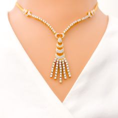 Adorn yourself with our Unique Heart Accented Chandelier Diamond Set. Crafted in 18k yellow gold and weighing 27.8 grams, this set features 3.75ct of round brilliant cut diamonds in F-G color and VS quality. The chandelier-style necklace has a drop length of 2", adjustable links of 1.8", and a heart accent. Matching screw-back earrings included with 1.2" length. Elevate your style with this exquisite piece. PRODUCT DETAILS Gold Purity(karat): 18k Item Weight(grams): 27.8 Item Finish: Yellow Gold Lock Style, Diamond Necklace Set, Chandelier Style, Vs Diamond, Chandelier Design, Diamond Set, Screw Back Earrings, Style Necklace, Gold Set