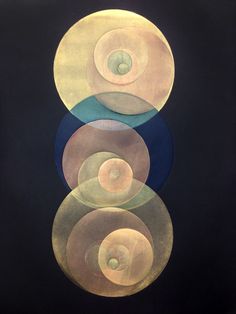 four circles are arranged in the shape of an abstract painting