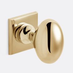 an image of a door knob with a ball on the front and one end in gold