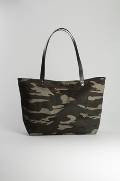 Details:  - Camouflage Tote Bag - Measurements: 32cm high x 49cm wide x 14cm deep - Black inside - Inner pocket - Black leather handles - Handmade in Barcelona   #totebag #camobag #bag #camuflaje #bolsos #handmade #fashion #lagut Khaki Tote Canvas Bag For On-the-go, Khaki Canvas Tote Bag For On-the-go, Versatile Khaki Canvas Tote Bag, Military Style Satchel Bag For Everyday Use, Military Style Satchel For Everyday Use, Military Style Canvas Bags For Everyday Use, Military Style Satchel Shoulder Bag For Everyday Use, Military Style Shoulder Bag For Travel, Military Style Satchel Bag For Daily Use