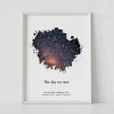 the day we met is written in black ink on a white background with an orange and pink galaxy