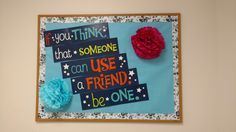 a bulletin board with flowers and words on it