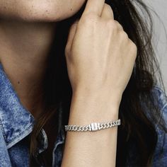 Elevate your look with the Pandora Timeless Pavé Cuban Chain Bracelet. This sterling silver bracelet features sparkling links in a chain. The top of each half circle is set with three round stones, while the back of the chain is polished for shine and comfort. The bracelet closes with a flat, square-shaped clasp featuring an engraved Pandora logo. Combining the linear geometry of our iconic chains with sparkling pavé, this sterling silver chain bracelet is a forever piece with of-the-moment appe Pandora Red, Pandora Heart, Bracelet Pandora, Heart Chain, Silver Chain Bracelet, Cute Bracelets, Bracelet Argent, Cuban Chain, Pandora Bracelet