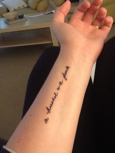 a woman's arm with a tattoo that reads, i love you to the moon and back