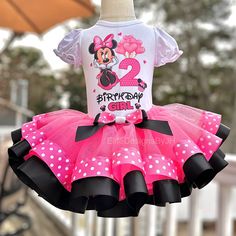 a pink and black minnie mouse birthday outfit