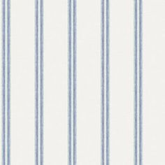 a blue and white striped wallpaper with vertical stripes on the bottom half of it