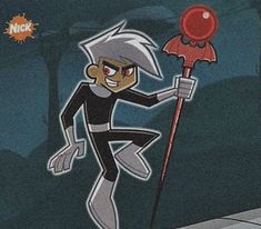 an image of a cartoon character holding a red object in his hand and standing on the ground