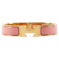 Hermès Clic H PM Bracelet in Papaye and Gold Wrist size: 16.8 cm Width: 12 mm Made in France Hermes Kelly Bracelet Gold Metal, Bracelet Hermes, H Bracelet, Modern Bracelets, Jewelry Inspo, Bracelets And Charms, Papaya, Ring Bracelet, Made In France