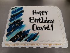 a birthday cake with the words happy birthday david written in black and blue frosting