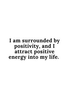 an image with the words i am surrounded by positivity, and i attract positive energy into my life