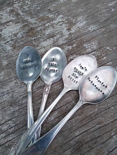 three spoons with words written on them