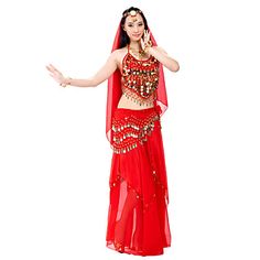 a woman in a red belly dance outfit with her arms out and one hand on her hip