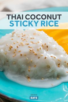 the cover of thai coconut sticky rice on a blue plate with mangos and milk