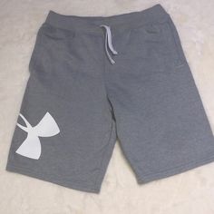 Excellent Condition Never Used Size Large Under Armour White Casual Shorts, Under Armour Casual White Shorts, Casual White Under Armour Shorts, Under Armour Casual Cotton Shorts, Under Armour Sporty Cotton Shorts, Under Armour Casual Sports Shorts, Sporty Cotton Shorts By Under Armour, Under Armour Shorts, Kids Bottoms