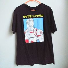 (Last One!) Marvel Japanese-Style Animated T-Shirt Rare Design Graphic Print Shirt. "Captain America" In Japanese (Katakana). Unisex Style. Super-Soft, Quality 100% Cotton. Size: Men's M (Approx. Women's L) New W/ Retail Tag. Animation Anime Cartoon Hip Movie Science Japan Kaiju Superhero Movies Anime Fiction Fantasy Usa America Tv Film Cinema Pop Culture Asia Asian Japan Japanophile Manga Drawing Screenprint Art School Nerd Blerd College Student Kid Teen Young Adult Millenial Hipster Indie Stre Venom Shirt, Japanese Katakana, Captain America Logo, Punisher T Shirt, Captain America Shirt, Avengers Shirt, Deadpool T Shirt, Indie Streetwear, Animation Anime