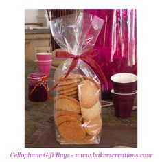 a bag filled with cookies sitting on top of a table