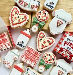 some decorated cookies are sitting on a table