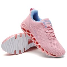 a pair of women's pink sneakers with white outs and light blue soles