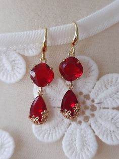 Very classy and a statement piece of jewellery  that suit and occasione, elegant classic bright red colour.  14k gold plated hooks. It's nickel-zinc free and skin friendly. A unique gift or mini indulgence for yourself,  a perfect addition to any outfit. Thank you for visiting my shop! If there is an item that you fancy but you would like an alteration made, please let me know with the details and I will try to accommodate your request. Alterations can include, but are not limited to, resizing, clasp changes, charm changes, preference for a different base metal: silver, copper, brass or gold. Where alterations are made, please allow up to 2 extra business days for your items to be sent. All items are handmade by me with care, love and attention. To ensure that you get the most out of your Earrings Teardrop, Earrings Red, Red Earrings, Copper Brass, Dangling Earrings, Last Minute Gifts, Base Metal, Bright Red, Gift For Mom