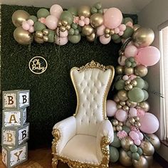 a room decorated with balloons and a chair