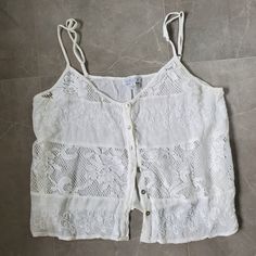 Super Flowy And Detailed Lace Button Up Tank Top. Shiny Shell Like Buttons. Would Be A Great Beach Or Pool Cover Up. Sadly Too Big For Me. Size M (I'm An Xs). True To Size, No Flaws That I'm Aware Of, Never Worn. White Summer Tops With Button Closure, Summer Button Tops From Urban Outfitters, Urban Outfitters Summer Tops With Buttons, Urban Outfitters Tops With Buttons For Day Out, Urban Outfitters Button-up Summer Tops, Urban Outfitters Summer Button-up Tops, Urban Outfitters Buttoned Tops For Day Out, Button Up Tank Top, Funky Shoes