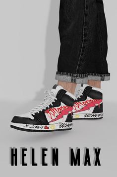 a pair of black and white sneakers with red writing on the soles that reads hellen max