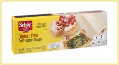 a box of gluen free puff pastry dough with pomegranates