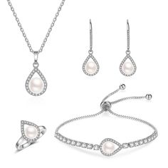 PRICES MAY VARY. 【Bridesmaid Jewelry Set Design】A round and flawless white freshwater pearl is elegantly surrounded by shining cubic zirconia, as if embraced by infinite love,which means that the relationship between the bride and the bridesmaid is pure and forever. This bridesmaid jewelry set is an ideal gift for your sister on your wedding day and let her know how important she is for you. 【High Quality Material】Classic style bridesmaid jewelry set features a cubic zirconia teardrop-shaped fra Bridesmaid Pearl Necklace, Bridesmaid Jewelry Set, Jewelry Set Design, Bridesmaid Pearls, Pearl Necklace Earrings, Gifts For Your Sister, Bridesmaid Jewelry Sets, Bracelet Ring, Bridesmaid Necklace