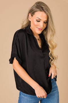 Luxe satin fabric+ a classic black hue makes this blouse a no-brainer! Features a chic collar and a pleated v neckline with a cling-free shape. Perfect for work or play, this blouse has endless styling possibilities! *also offered in wine and navy* Satin V-neck Top For Office, Satin V-neck Blouse For Night Out, Versatile V-neck Blouse For Night Out, Chic Satin V-neck Tops, Formal Satin V-neck Top, Solid V-neck Blouse For Date Night, Solid Color V-neck Blouse For Date Night, Satin V-neck Top For Work, V-neck Satin Blouse For Office