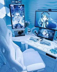 a white chair sitting in front of a computer desk with two monitors on top of it