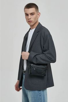 Meet your new go-to accessory: the Crossbody Box Bag with Attached Chain Detail, where style meets practicality.

Crafted with an edgy mix of textures and a thoughtfully designed pattern, this bag is made for those who appreciate a touch of moody sophistication. The exterior boasts a durable, grainy finish complemented by a bold chain detail, offering a juxtaposition of nonchalance and polish. Inside, the bag features a neatly organized compartment with a dedicated space to secure your essential Modern Box Bag With Chain Strap, Modern Black Shoulder Bag With Chain, Modern Clutch Box Bag With Chain Strap, Modern Box Bag With Chain Strap For Everyday Use, Edgy Rectangular Shoulder Bag With Chain Strap, Modern Travel Bag With Chain Detail, Modern Crossbody Box Bag With Chain Strap, Edgy Shoulder Bag With Chain Strap, Edgy Shoulder Bag With Chain Strap For Everyday