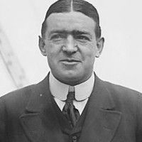 an old black and white photo of a man in a suit