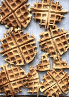 several waffles are arranged on a sheet of paper