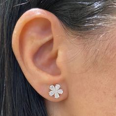 Secure your beautiful, blooming style with these gorgeous Diamond Flower Stud Earrings. One round diamond is featured at the center of each stud, while five pear-shaped diamonds flare out like sparkling petals. These 18K gold earrings thrive in an ear stack or alone, making them a versatile piece every flower lover needs in their collection. - 18K gold weighing 2.09 grams - 10 pear-shaped diamonds weighing 1.36 carats - 2 round diamonds weighing 0.04 carats - Color - F-G - Clarity - VS2-SI1 Avai Gold Heart Stud Earrings, Diamond Ear Cuff, Gold Heart Studs, Gold Diamond Studs, 18k Gold Earrings, Gold Ear Cuff, Bar Stud Earrings, Ear Stack, Flower Stud Earrings