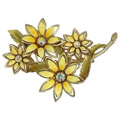 Chic 60s CORO signed yellow enamel and gold large brooch ! Each daisy is encrusted with a rhinestone. Add some flare to any outfit with this beauty. In great condition Made in USA Measures 3 inches across, and 2.5 inches up and down Retro Gold Enamel Brooches, Coro Jewelry, Bird Brooch, Enamel Brooch, Butterfly Brooch, Gold Butterfly, Diamond Flower, Flower Pins, Dream Board