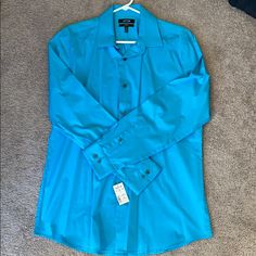 Nwt, Beautiful Shade Of Blue (Color Is “Regatta Bay”). Stretch, Slim Fit Men’s Shirt Never Worn. Fitted Blue Shirt For Semi-formal Occasions, Blue Fitted Shirt With Spread Collar, Blue Fitted Shirt With Button Closure, Fitted Blue Shirt With Button Closure, Blue Fitted Cotton Dress Shirt, Fitted Blue Cotton Dress Shirt, Fitted Blue Dress Shirt For Office, Blue Shades Colors, Fit Men