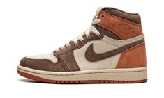 The Women’s Air Jordan 1 High OG “Dusted Clay” is a women’s-exclusive colorway of Michael Jordan’s first signature shoe with an earth tone design.  The upper is complete with a cream suede base with a combination of Cacao Wow suede overlays on the toe, forefoot, eyelets, and Swoosh.  Dusted Clay suede overlays can be found on the collar and heel.  A debossed “Wings” logo appears on the collar, while “Nike Air” branding is seen on the tongue tag.  Underfoot, a cream rubber midsole and a Dusted Clay rubber outsole complete the look.  Release date: March 6, 2024 Clay Shoes, Wmns Air Jordan 1, Jordan 1 High Og, Wings Logo, Air Jordan 1 Retro High Og, Air Jordan 1 High, Jordan 1 High, Air Jordan 1 Retro, Jordan 1 Retro High