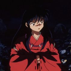 an anime character with long black hair wearing a red kimono